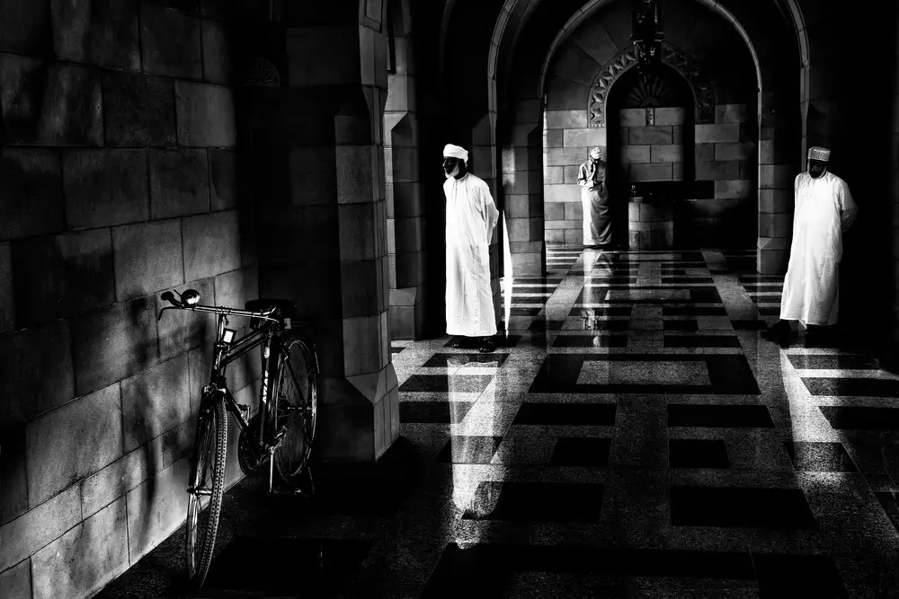 Cavalli, Giovanni: Three men (and a bicycle) in Muscat