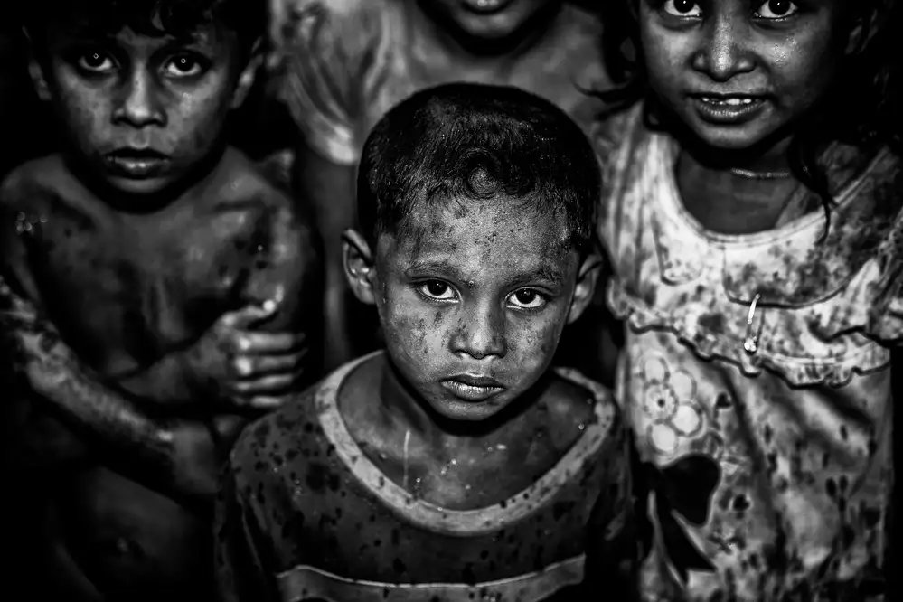 Garmendia, Inazio Joxe: Rohingské děti v dešti.