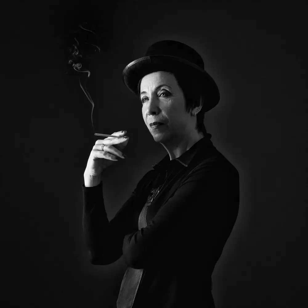 Refat: A woman with a cigarette.
