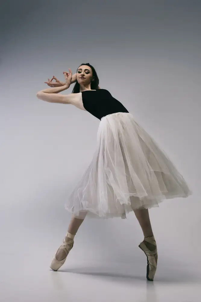 Alexandr: The courage. a young ballerina in a black skirt and Chopin is standing on pointe shoes