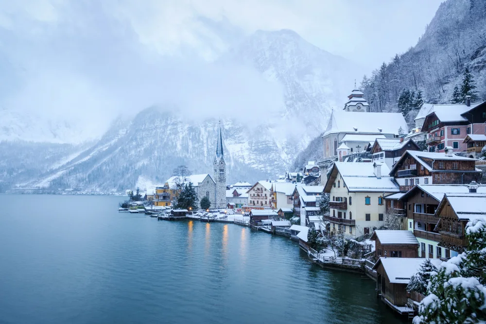Stroujko, Boris: Snow covered Hallstatt village in winter, Austria