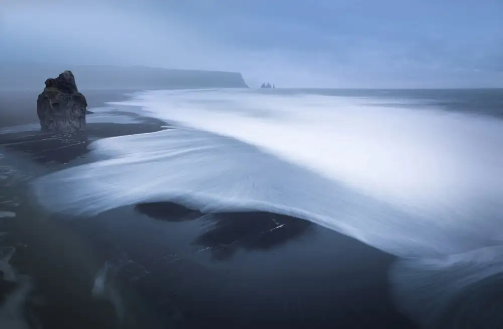 Schumacher, Nicolas: The black lava beach of Vik