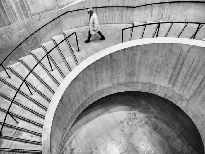 Mukherjee, Debarshi: Caught in the Middle