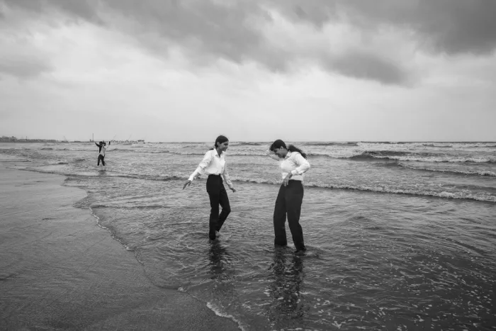 Das, Subhajit: Two girls dancing under clouds