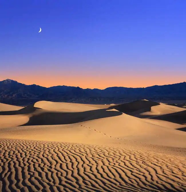 Unknown: Soleil matinal dans le parc national de la Vallée de la Mort, Californie, États-Unis