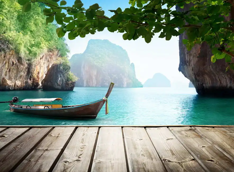 Unknown: Andaman Sea and wooden boat in Thailand