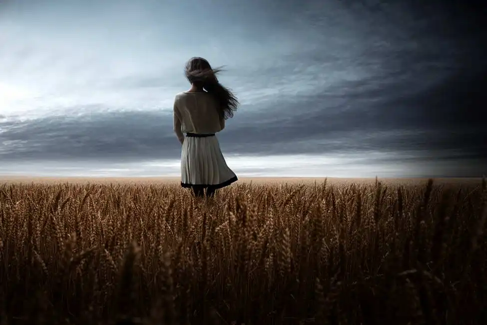 Unknown: Girl in a wheat field