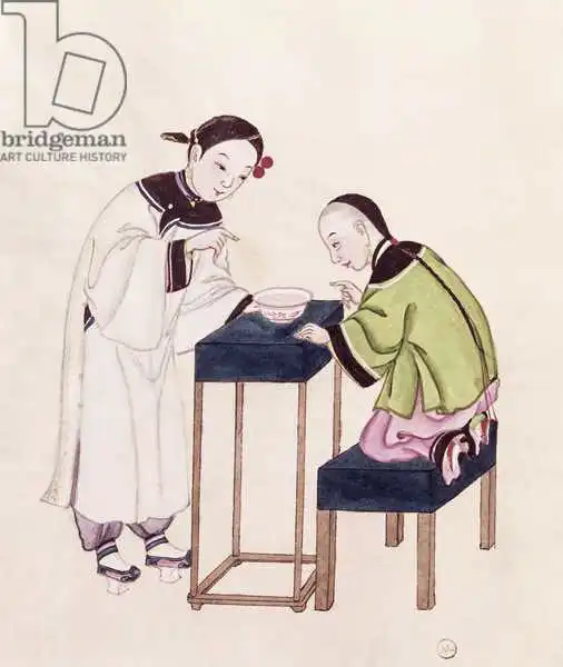 Chinese Schoo: A Girl Looking for Luck into a Bowl of Water