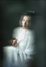 Wang, Catherine: Ancient Chinese Girl with a Round Silk Fan