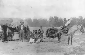 Unknown: Family Stump Horn of Cheyenne tribe outside the tent