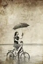 Unknown: Girl with umbrella on bike