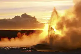 Unknown: Yellowstone geyser at sunset