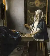 Vermeer, Jan: Woman Holding a Balance